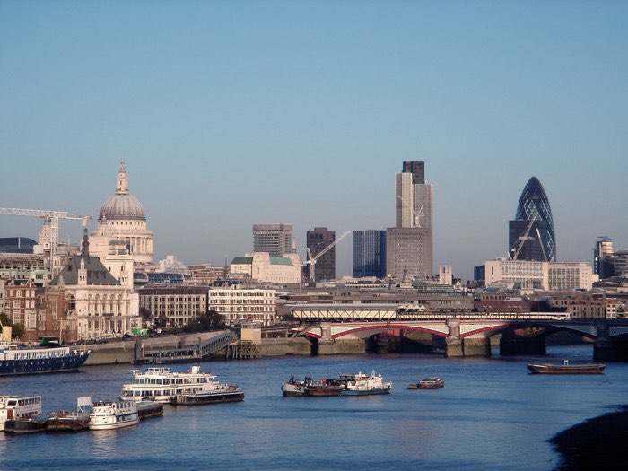 London skyline at sunset over the River Thames
